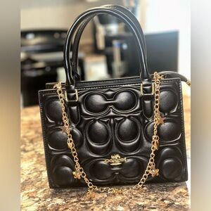 Coach Black Embossed Shoulder Bag with Gold Accents
